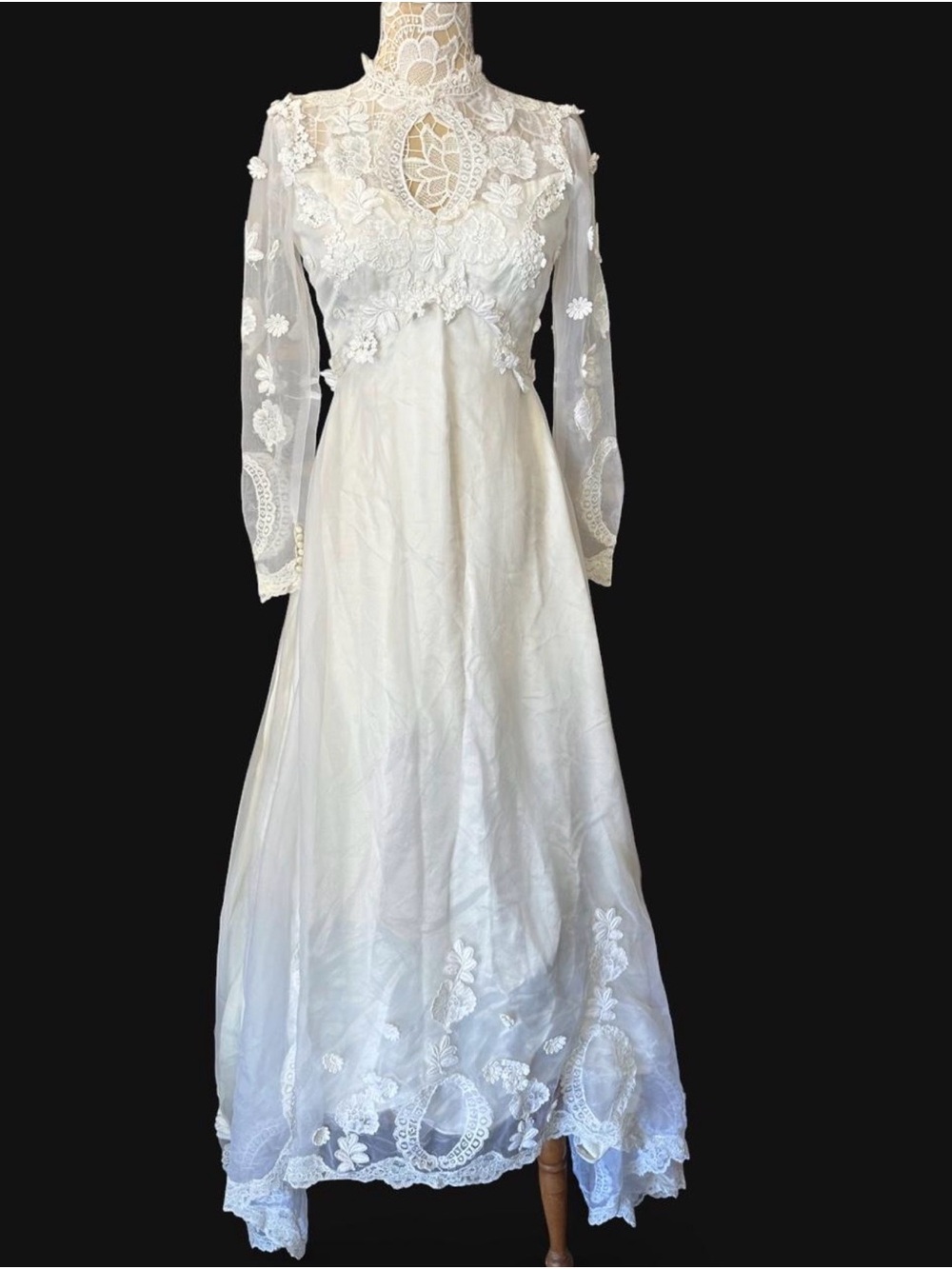 Vintage wedding dress featuring a stunning train